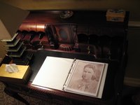 photo of Marjie's photo displayed on a desk at her funeral
